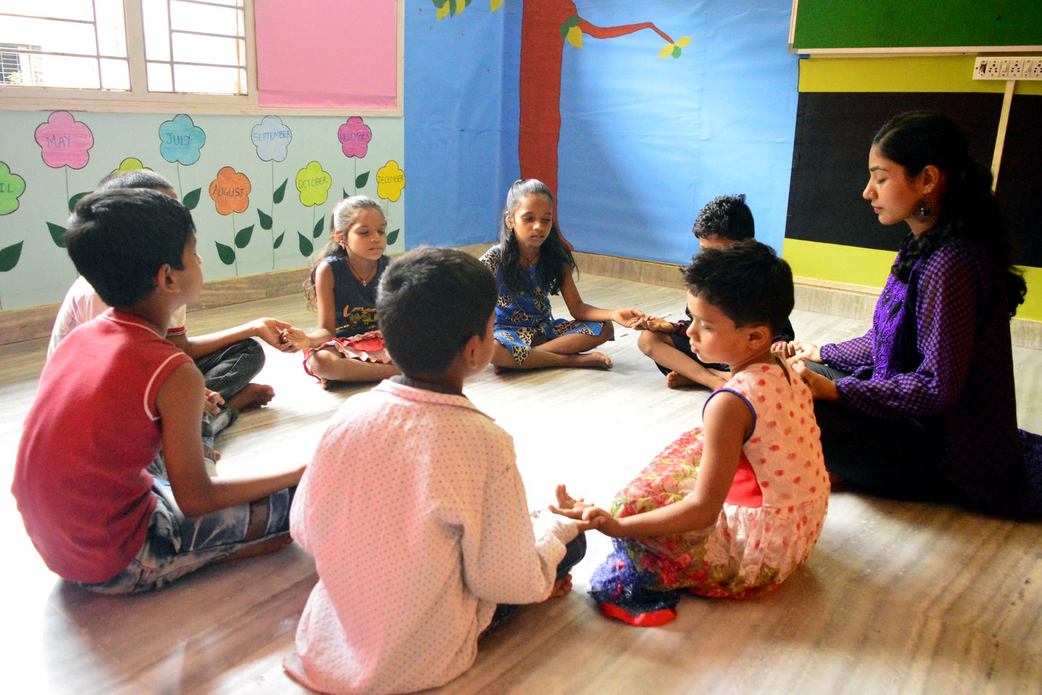 Children learning together at Touching Lives